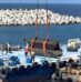 Archaeologists are lifting 70- to 80-ton stones from the legendary Lighthouse of Alexandria, and the most intriguing part is that some pieces appear to be part of a long-lost monumental doorway