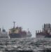 In Strait of Hormuz, Iran and China take aim at US dollar hegemony