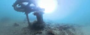 Divers try to solve mystery of 100-year-old shipwreck